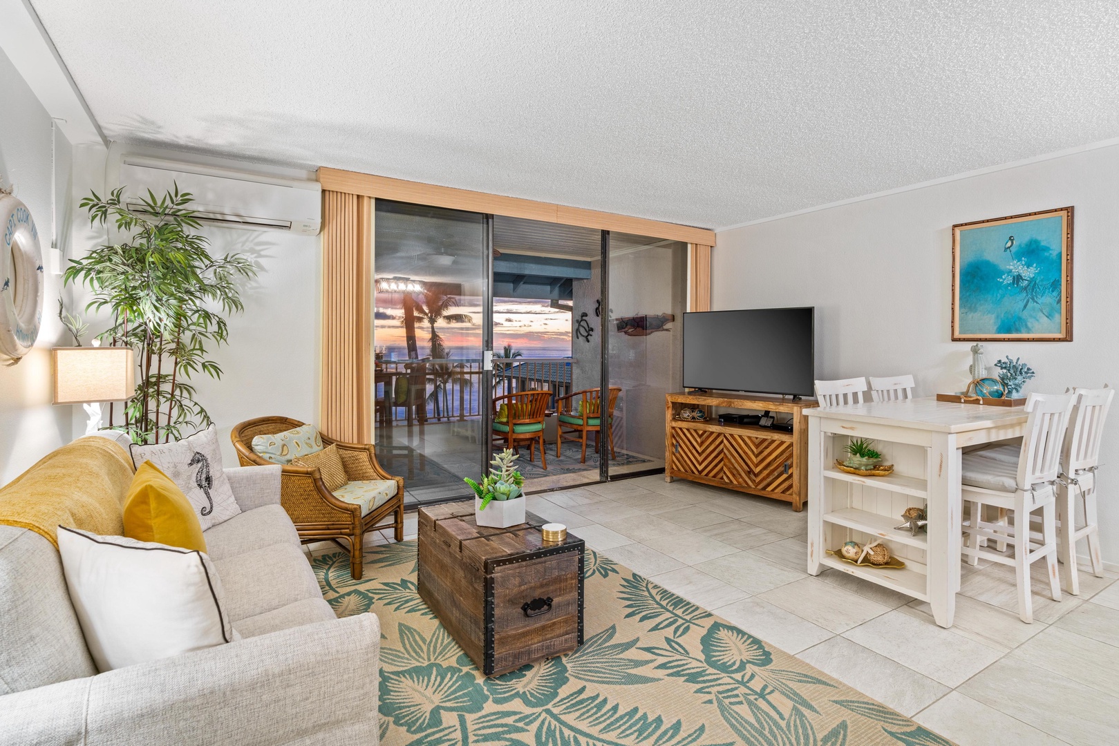 Unwind in your inviting coastal retreat, where breezy tropical decor and ocean sunset views create the perfect beachside escape for you to savor.