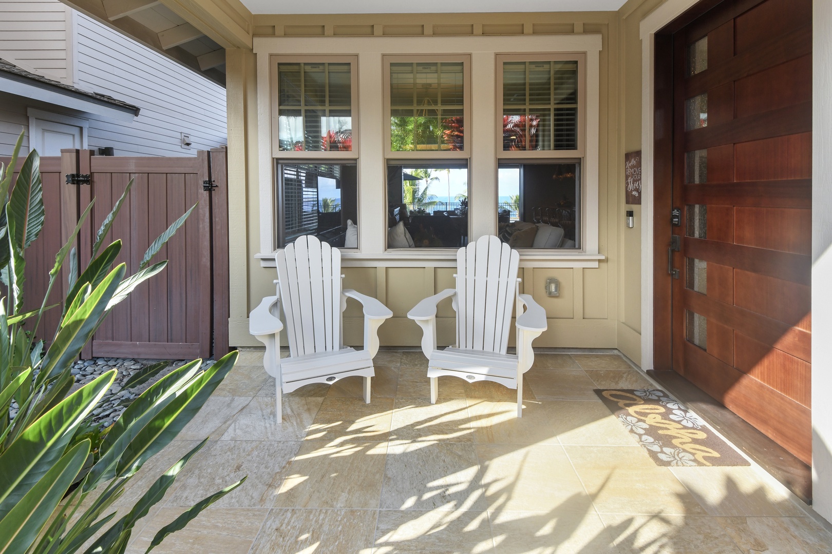 Your private front porch offers a peaceful retreat with comfortable Adirondack chairs perfect for morning coffee or evening relaxation.