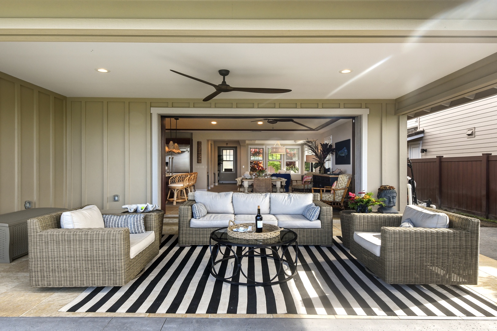 Relax in your covered lanai with plush seating and seamless indoor-outdoor flow, perfect for entertaining or unwinding.