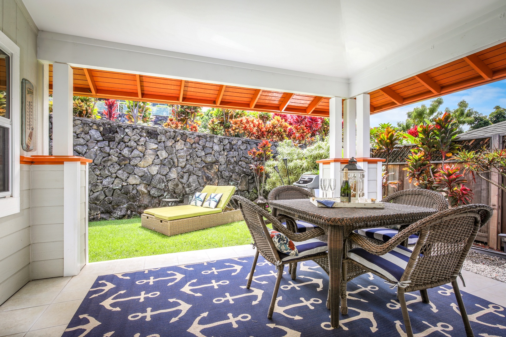 Dine al fresco or unwind on your private covered lanai, where lush gardens and cozy seating invite you to savor every tropical moment.