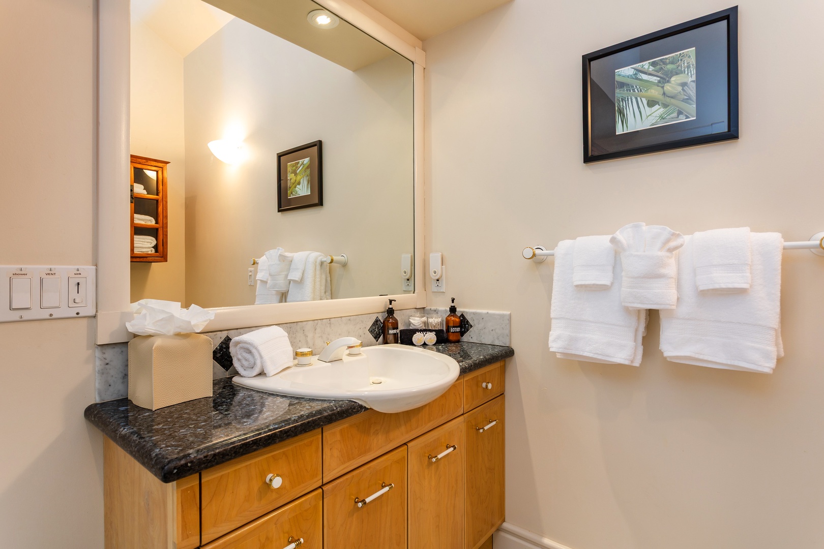 Guest Bedroom - Freshen up in your private bathroom, outfitted with plush towels, granite counters, and all the essentials for a comfortable stay.