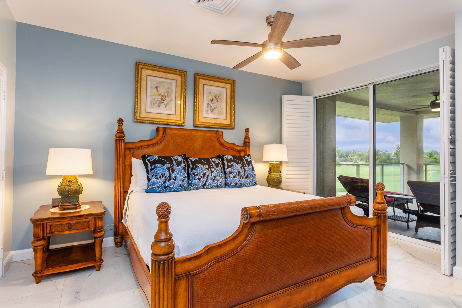 Drift off in your serene bedroom where elegant wooden furnishings meet calming coastal tones. The balcony opens to lush golf course vistas—your peaceful retreat awaits.