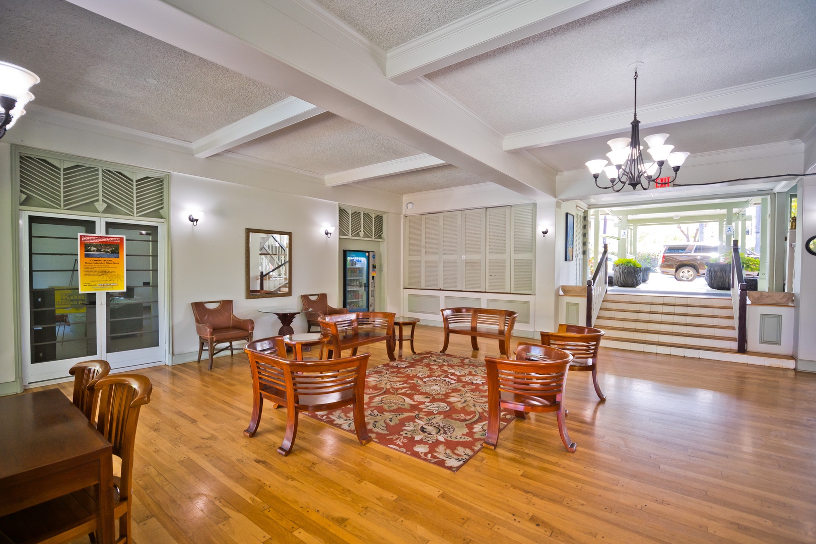 Settle into this welcoming lobby where warm wood tones and classic furnishings invite you to relax and feel at home the moment you arrive.