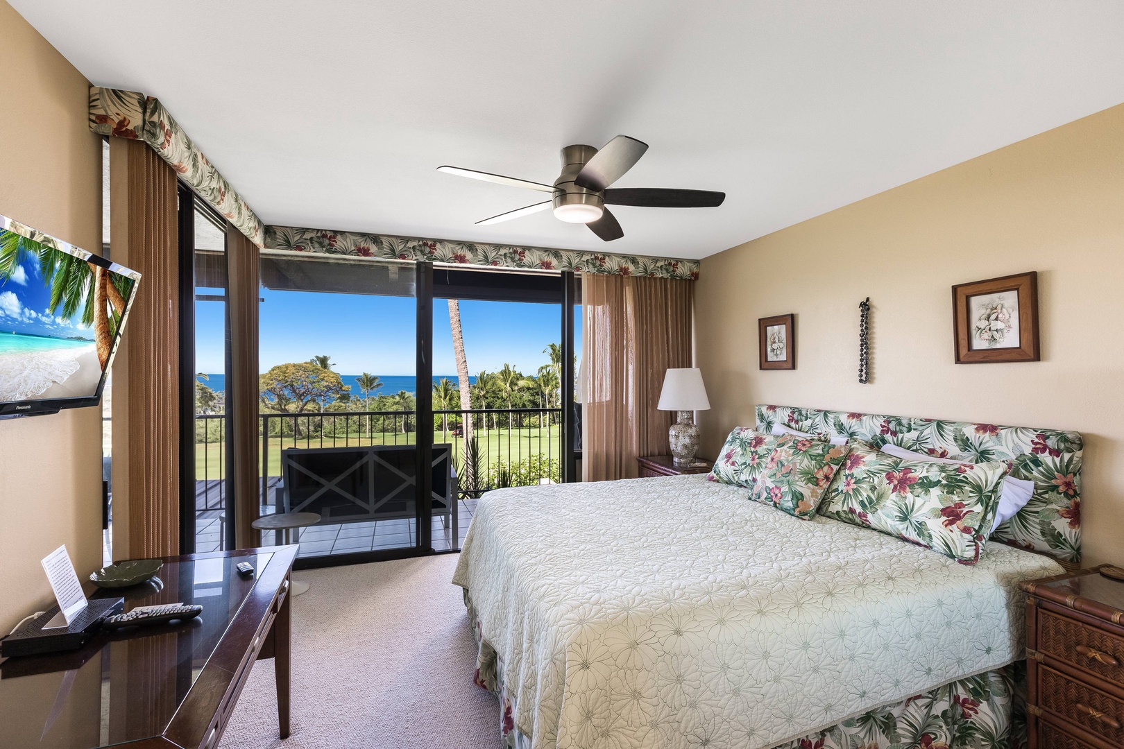 Wake up to stunning ocean views and gentle tropical breezes in this light-filled bedroom. Your private balcony opens to lush grounds and sparkling blue waters, creating a serene island escape.