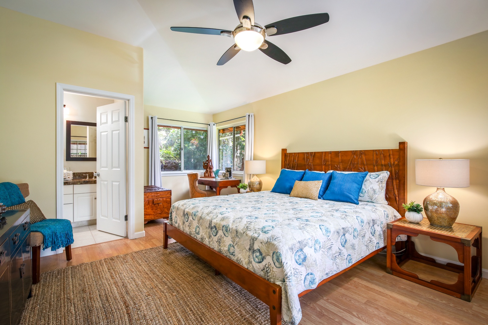 Drift into restful sleep in your bright bedroom featuring a handcrafted wooden bed, soft linens, and calming natural light that fills the space with warmth and tranquility.