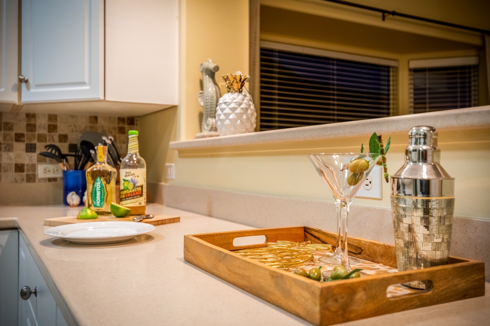 Your fully equipped kitchen awaits with sparkling counters and everything needed to craft your favorite cocktails or prepare meals, making you feel right at home during your stay.
