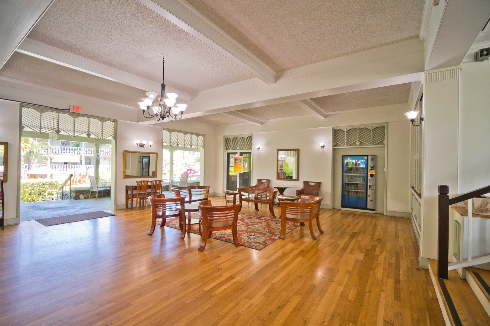 Bright lobby welcomes you with gleaming hardwood floors, elegant furnishings, and refreshments at your fingertips—your home away from home starts here.