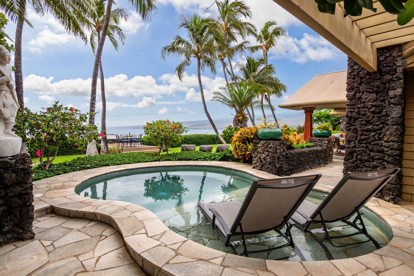 Unwind in your private plunge pool while swaying palms frame breathtaking ocean views. Feel the tropical breeze as you lounge in paradise, steps from the beach.