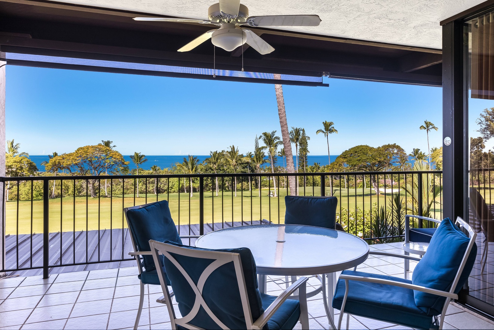 Sip your morning coffee on your private balcony with panoramic ocean views over swaying palms and lush greens—a serene retreat that's entirely yours.