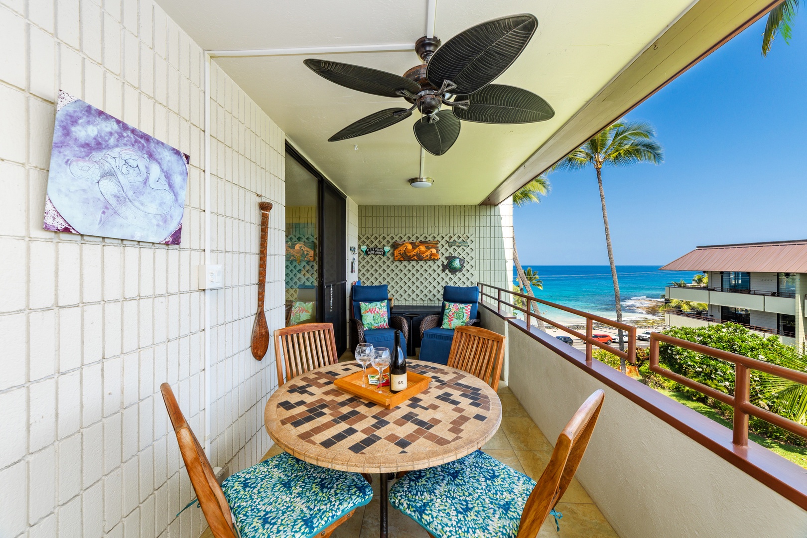 Sip your morning coffee on your private balcony while palm trees sway and turquoise waves roll onto the shore below. Kick back in comfortable seating and feel the ocean breeze cool your skin as you take in stunning coastal views.