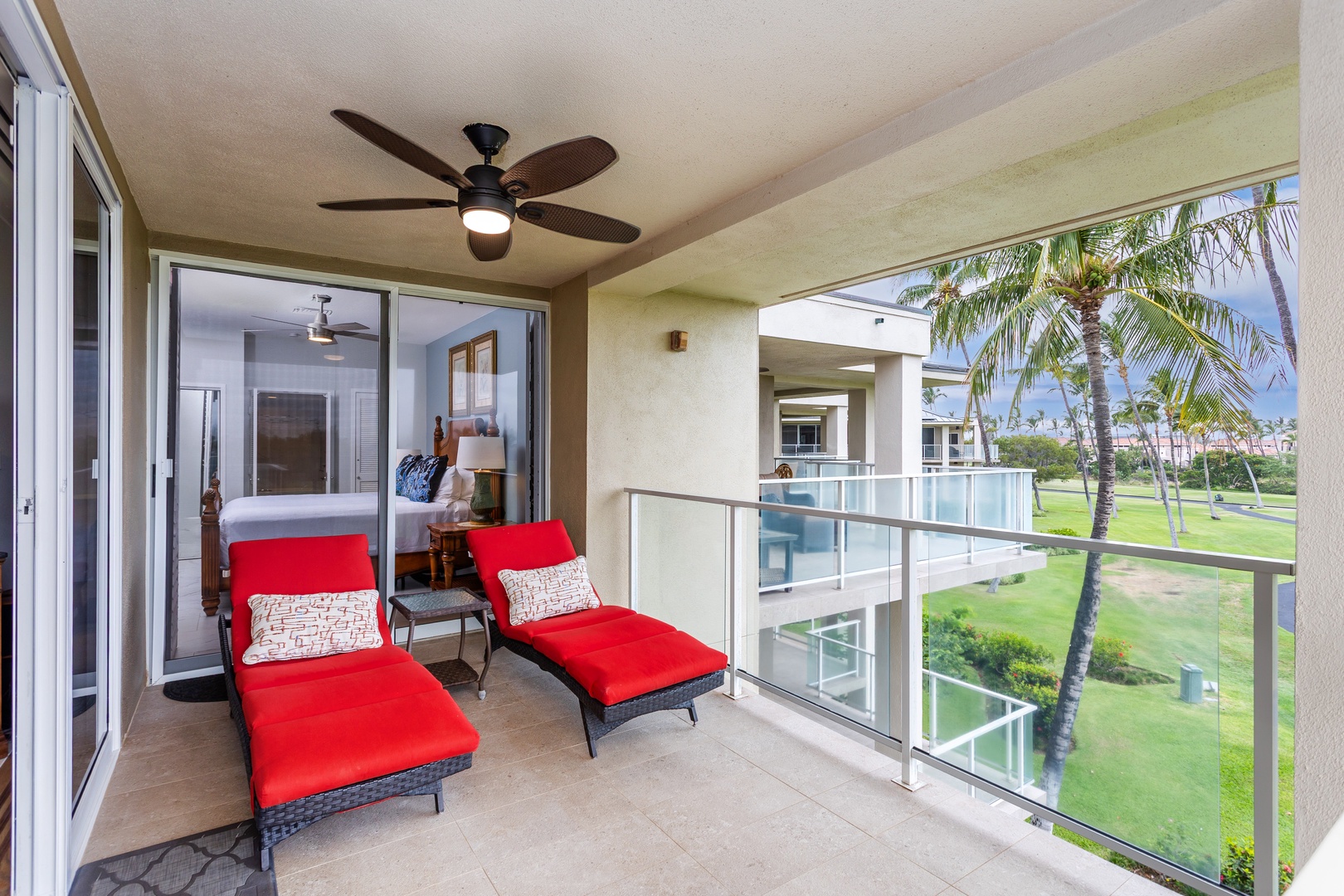 Step onto your private balcony and sink into a lounge chair with tropical breezes and serene resort views—perfect for morning coffee or sunset relaxation.