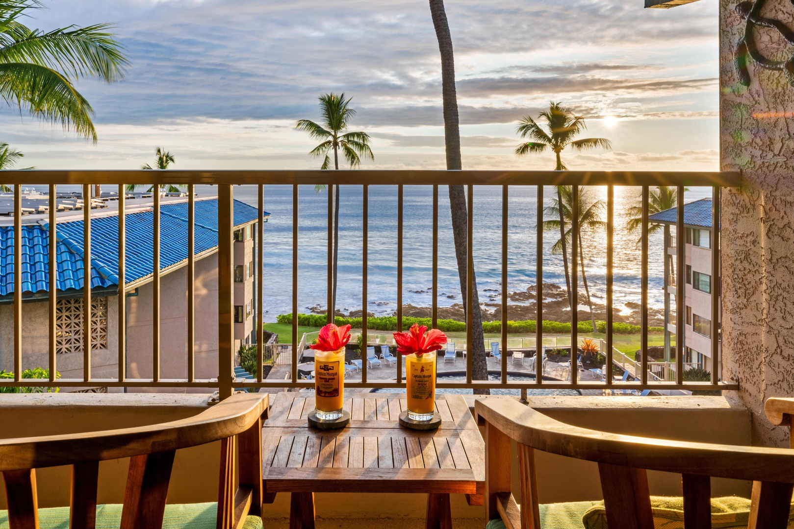 Sip your morning drink on your private lanai, where swaying palms frame sparkling ocean views and golden sunlight dances across the water—pure island bliss awaits.