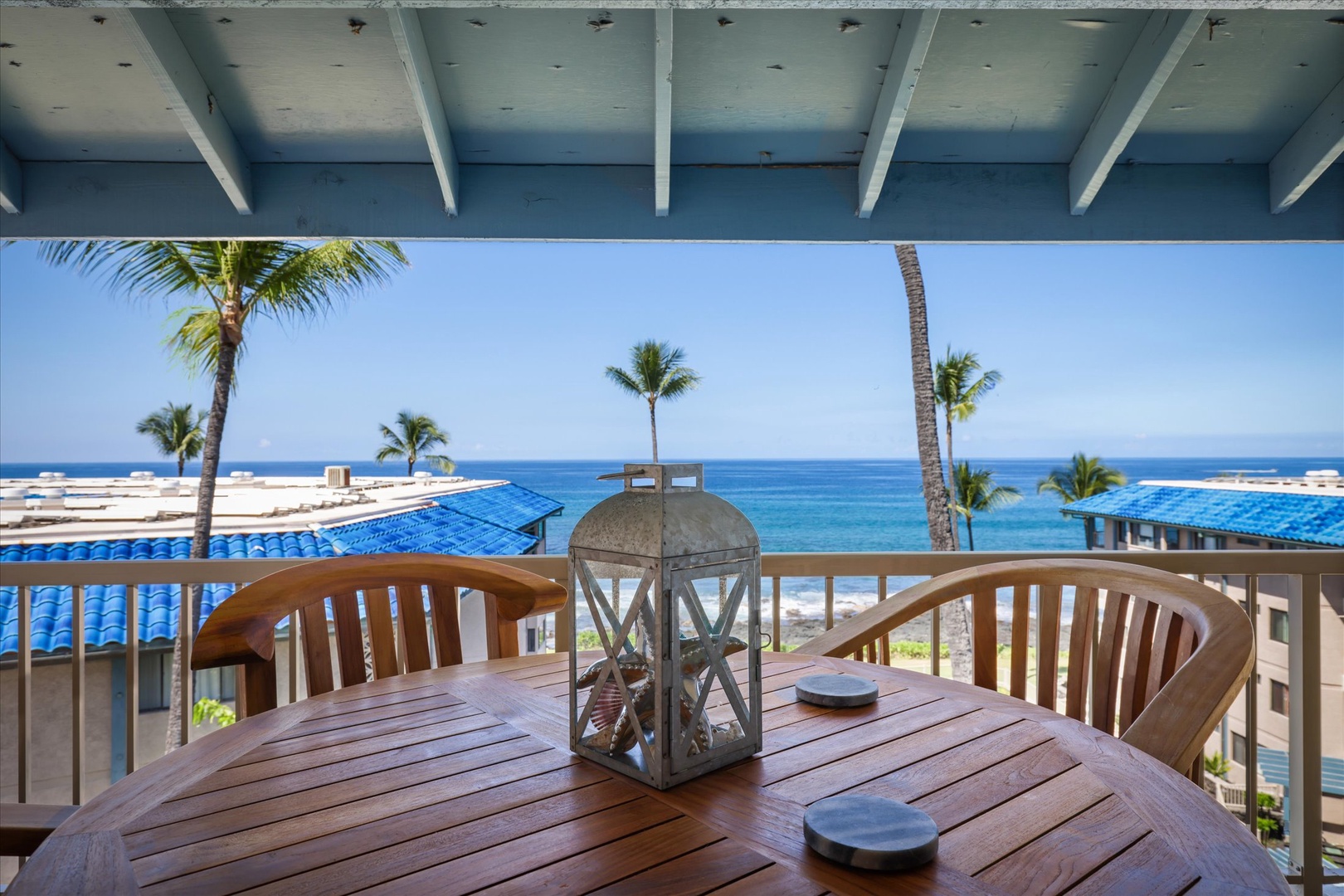 Savor morning coffee or evening cocktails at your private lanai, framed by swaying palms and endless blue ocean views.
