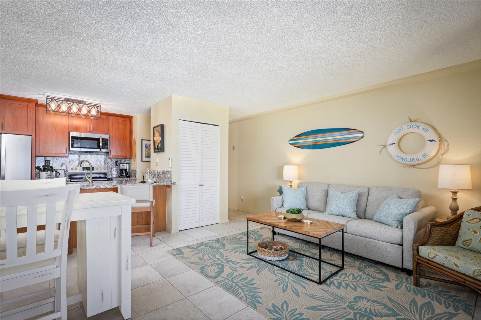 Relax in your bright, beachy living space with coastal décor and a well-equipped kitchen. Your home-away-from-home features comfy seating, tropical accents, and everything you need for meals or lounging.