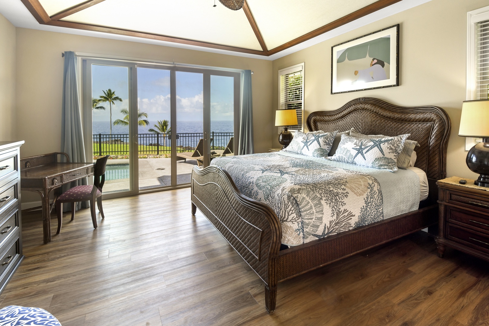 Wake up to stunning ocean views through your floor-to-ceiling sliding glass doors, where tropical breezes and the sound of waves create your perfect morning ritual.