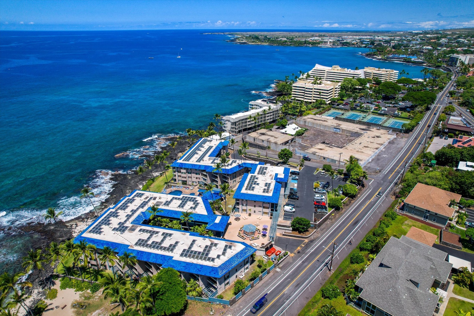 Kona Reef is nestled along Hawaii's scenic coastline, bordered by turquoise waters and convenient Alii Drive access.