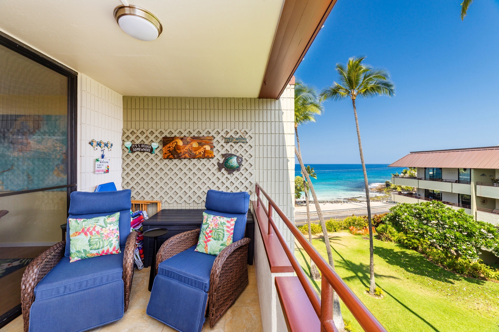 Settle into your private balcony with tropical breezes and stunning ocean views—your perfect spot to unwind with morning coffee or watch the sunset over swaying palms.