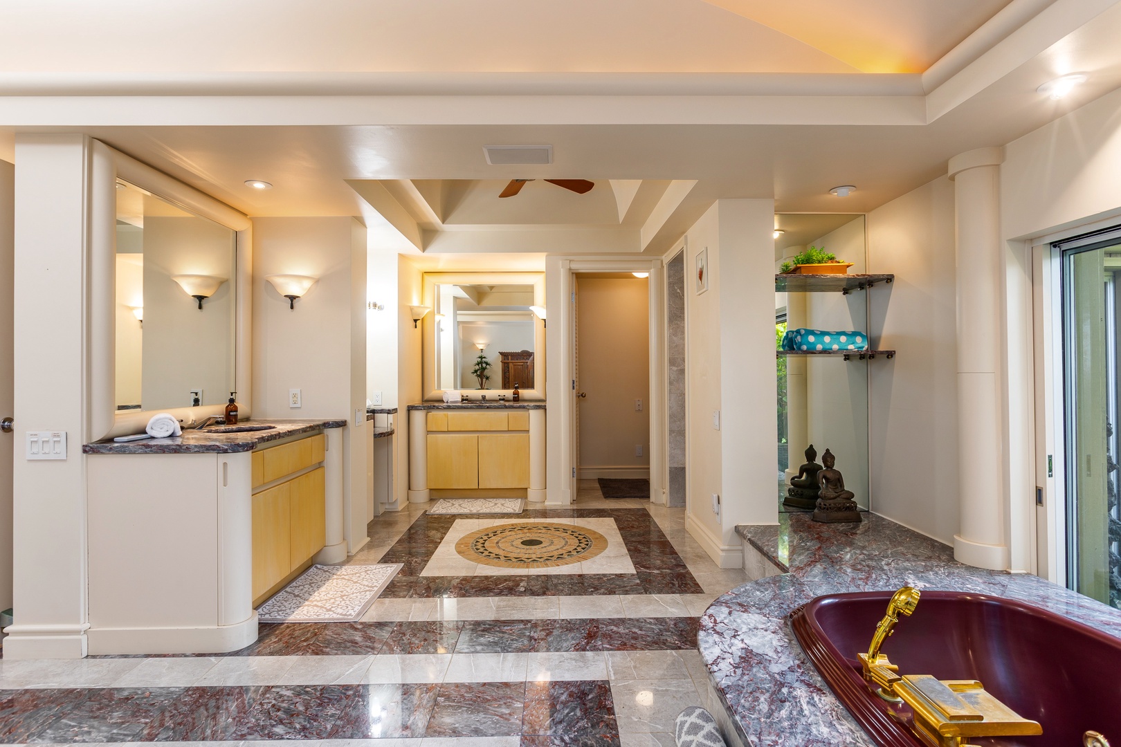 Primary Bathroom - Step into your luxurious sanctuary with gleaming marble floors, elegant accent lighting, and rich granite countertops creating a spa-like atmosphere that blends comfort with refined sophistication.