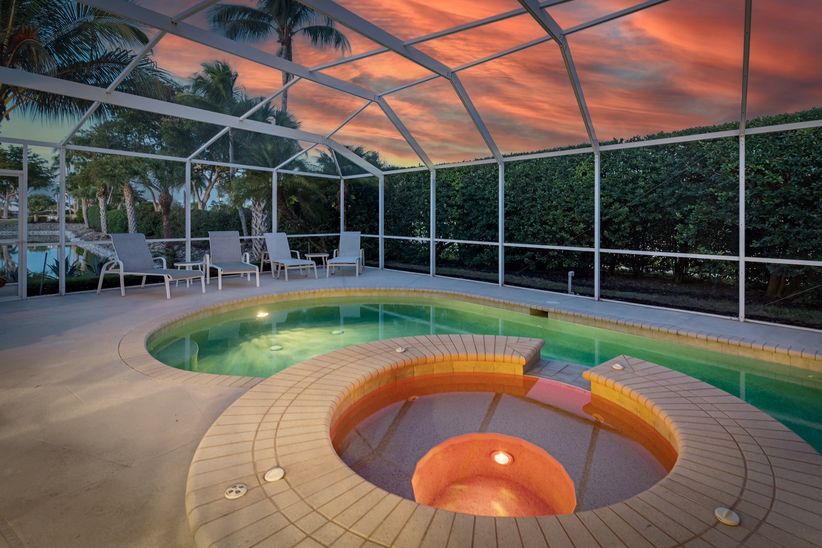 Unwind in your private screened pool and spa as dramatic sunset colors paint the sky overhead.