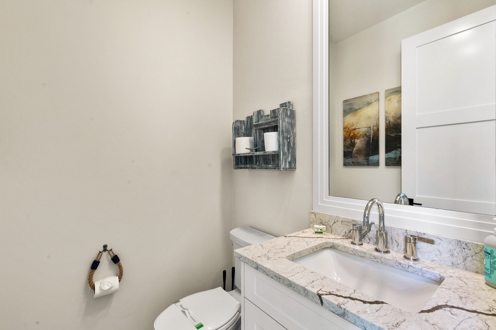 Step into your own spa-like retreat, where elegant marble countertops and a polished sink offer a soothing space to refresh and unwind after a day of adventure.