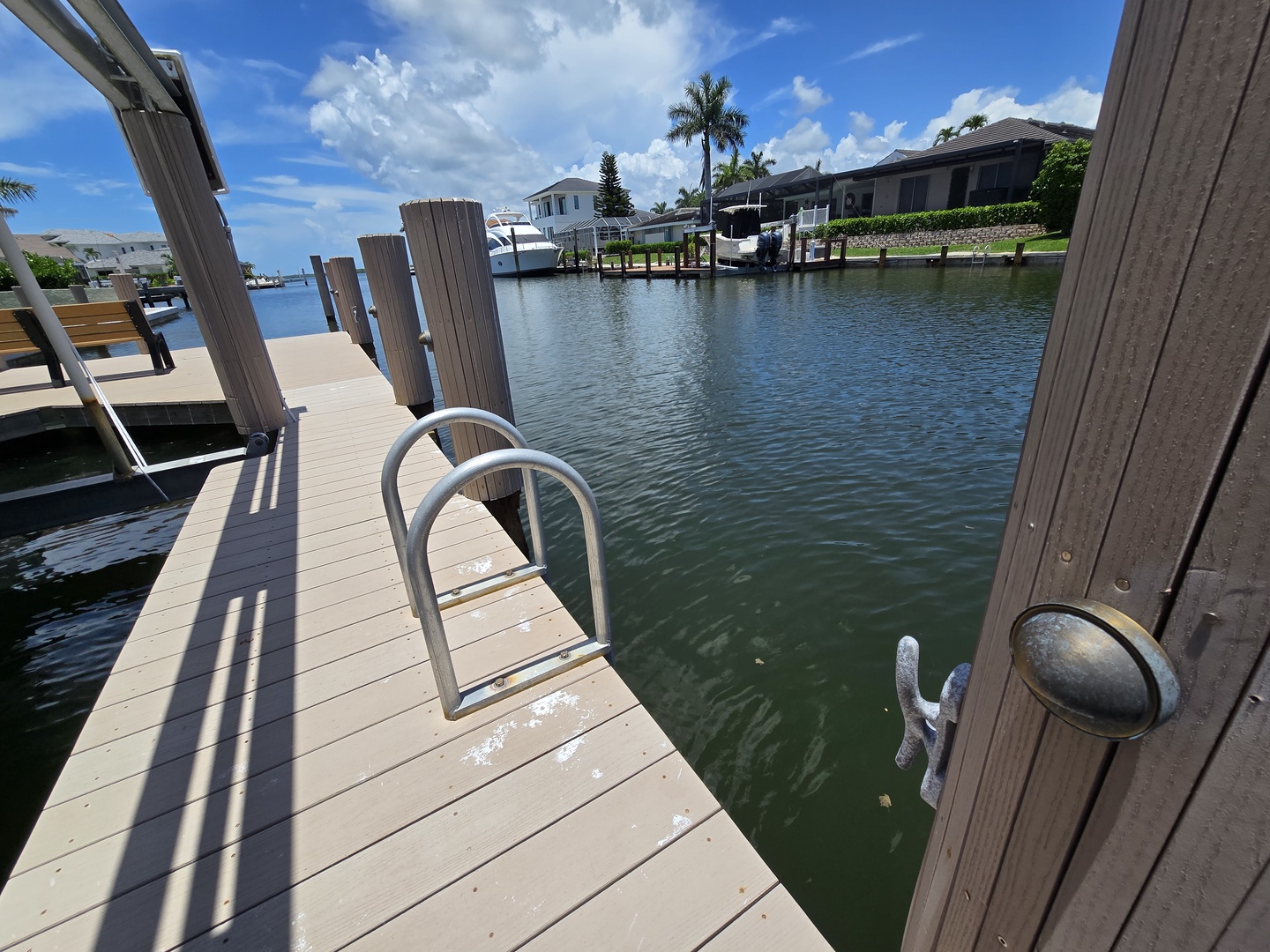 Step onto your private dock and dive into crystal-clear waters whenever you please, with boats and waterfront homes creating a perfect tropical escape.
