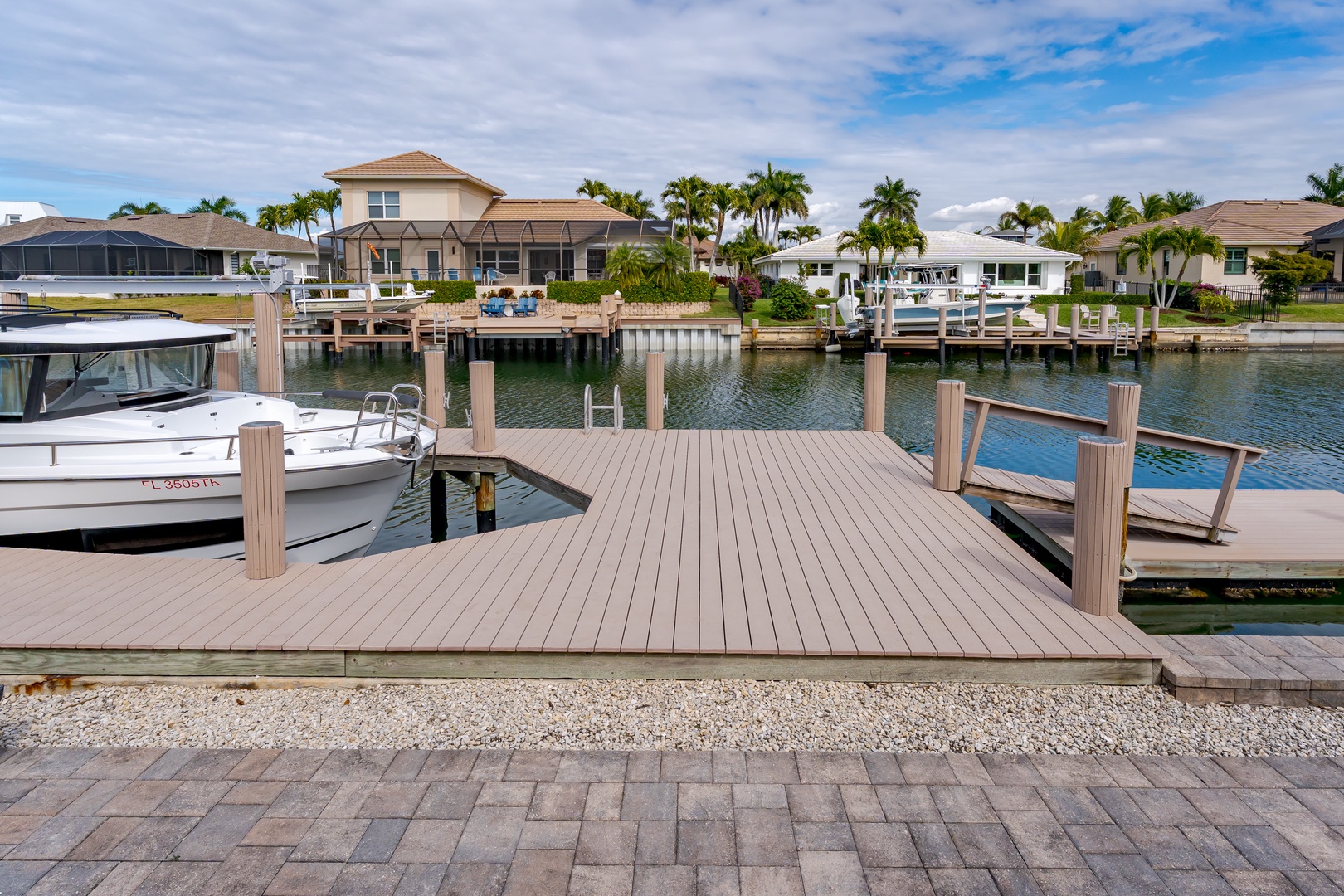 Private dock with direct canal access for boating adventures in this waterfront community setting.
