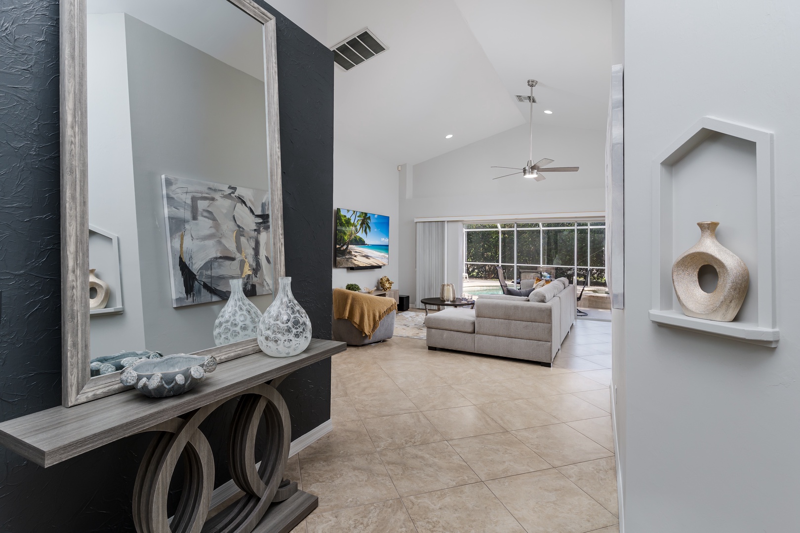 You'll love the open, airy living space with vaulted ceilings and elegant décor creating your perfect vacation retreat.