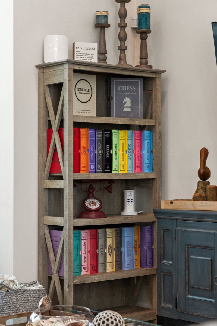 Cozy up with your favorite book from the rustic bookshelf filled with classics, board games, and charming decor that makes you feel right at home.