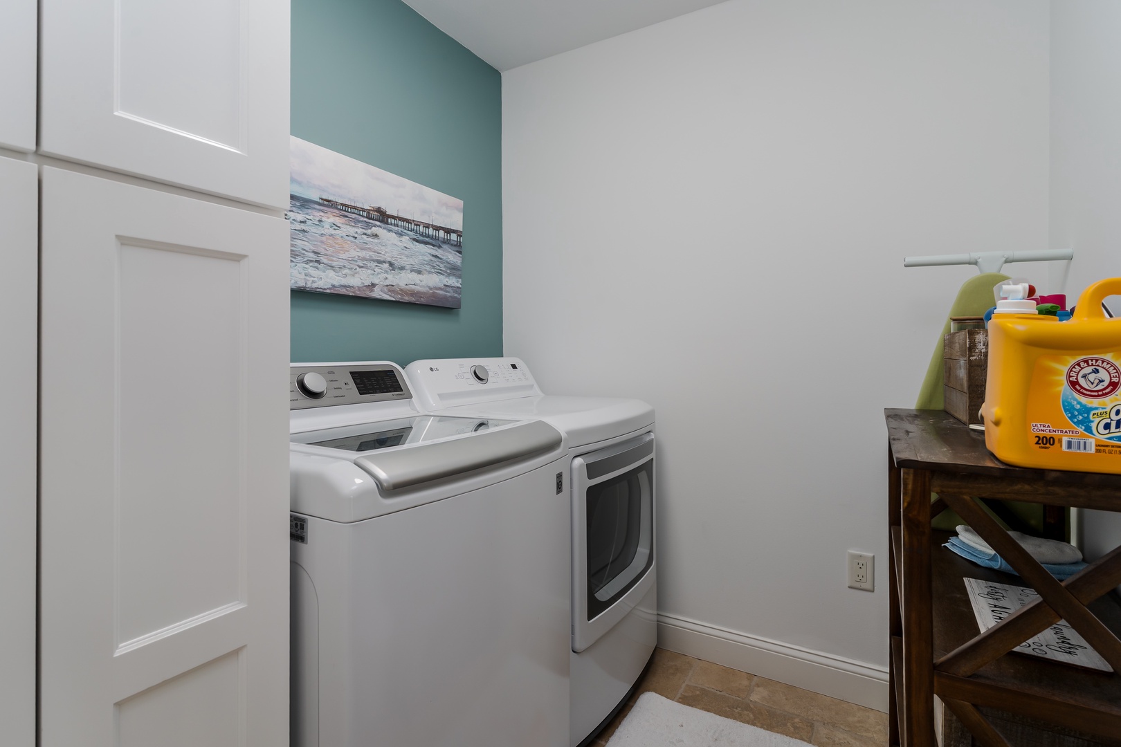 Your private laundry room makes extended stays effortless with full-size washer and dryer plus convenient storage space.