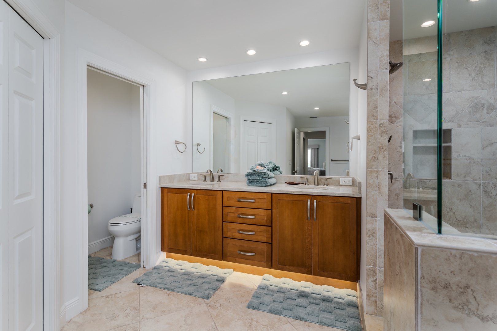 Unwind in your luxurious ensuite with dual vanities, marble finishes, and a spa-like atmosphere that transforms your daily routine.