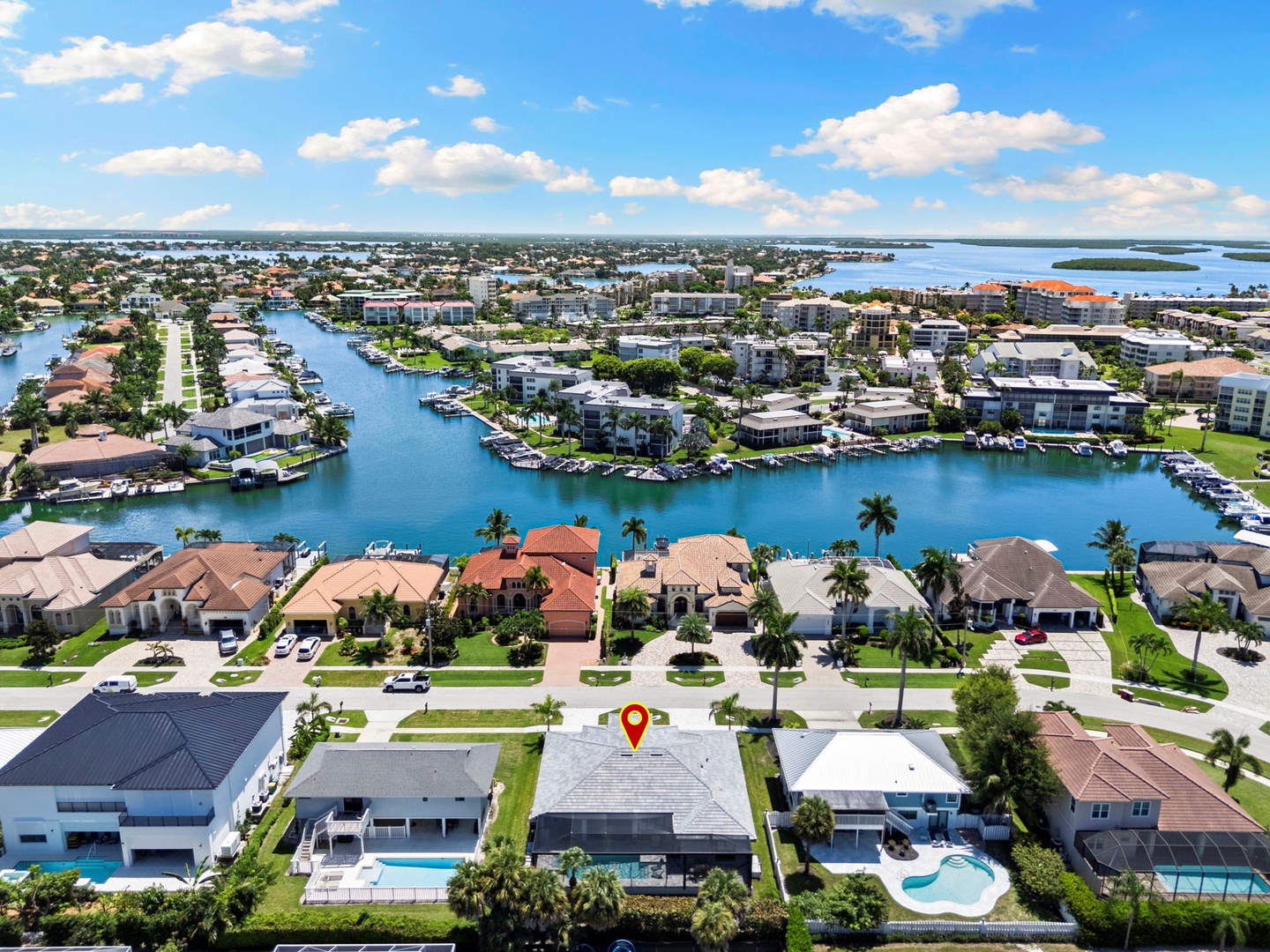Stunning waterfront neighborhood with canal access and expansive bay views, perfect for boating enthusiasts and peaceful getaways.