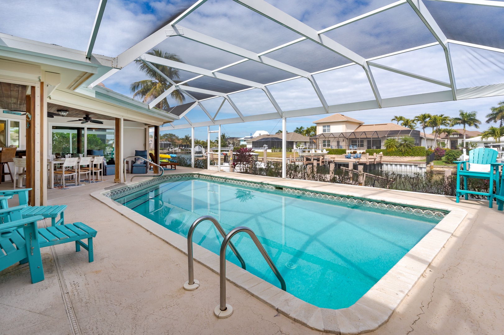 Slip into your private oasis under the glass-enclosed pool pavilion, where tropical breezes meet crystal-clear waters for the perfect swim.