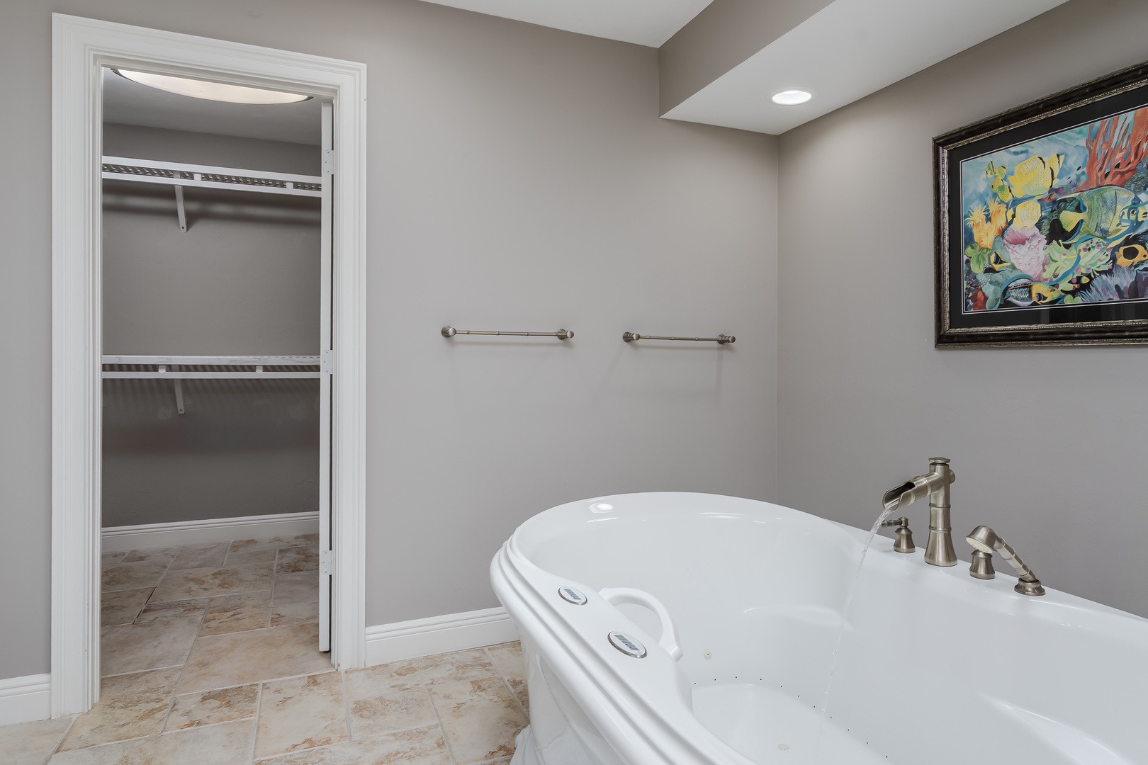 Sink into the deep soaking tub and let the jets melt away your stress, with a walk-in closet just steps away for your convenience.