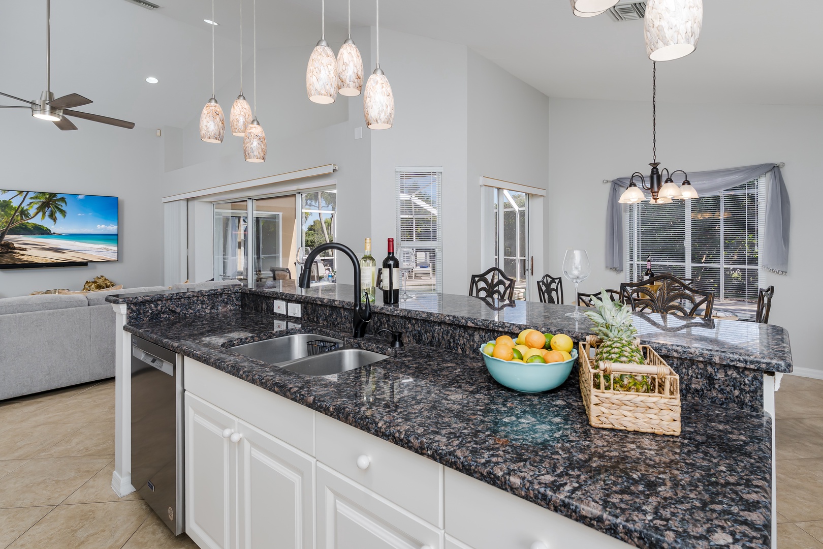 Your gourmet kitchen features granite countertops, stainless appliances, and elegant pendant lighting—perfect for preparing meals and gathering with loved ones.