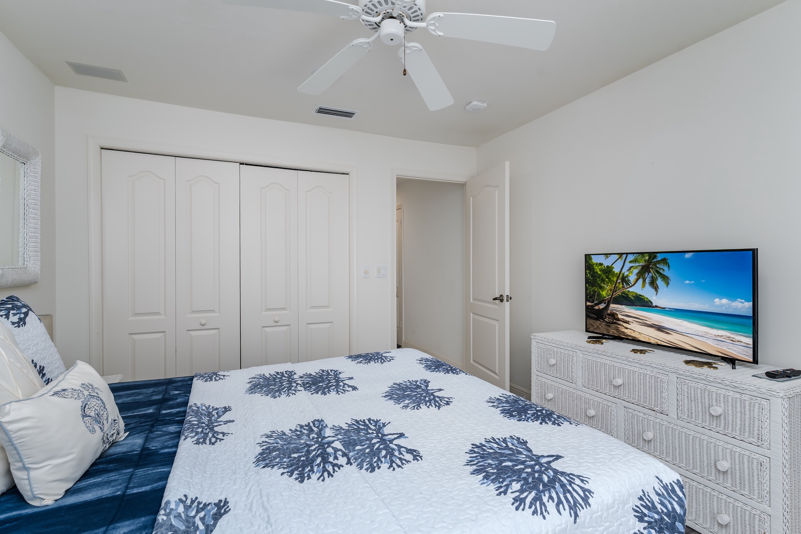 Unwind in your serene bedroom with a comfortable bed, ceiling fan to keep you cool, and entertainment at your fingertips. Ample closet space ensures you feel right at home.