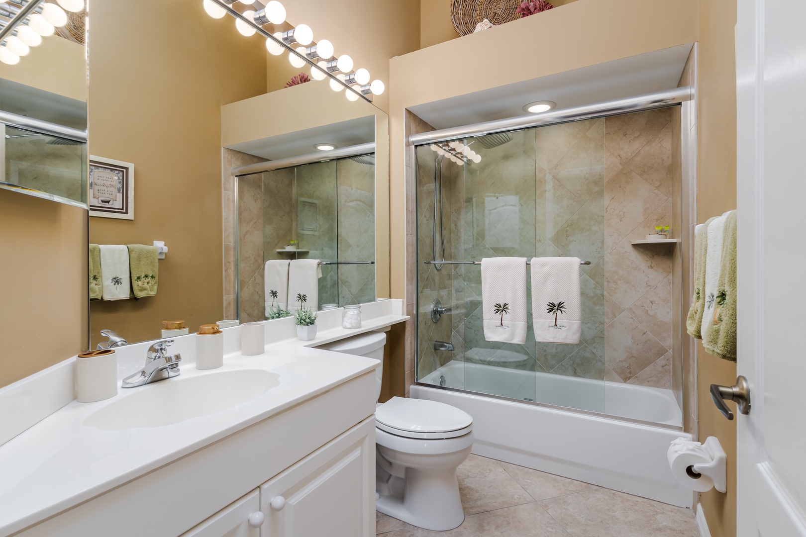 Step into your elegant bathroom with marble tile shower, vanity lighting, and premium fixtures for your daily refresh.