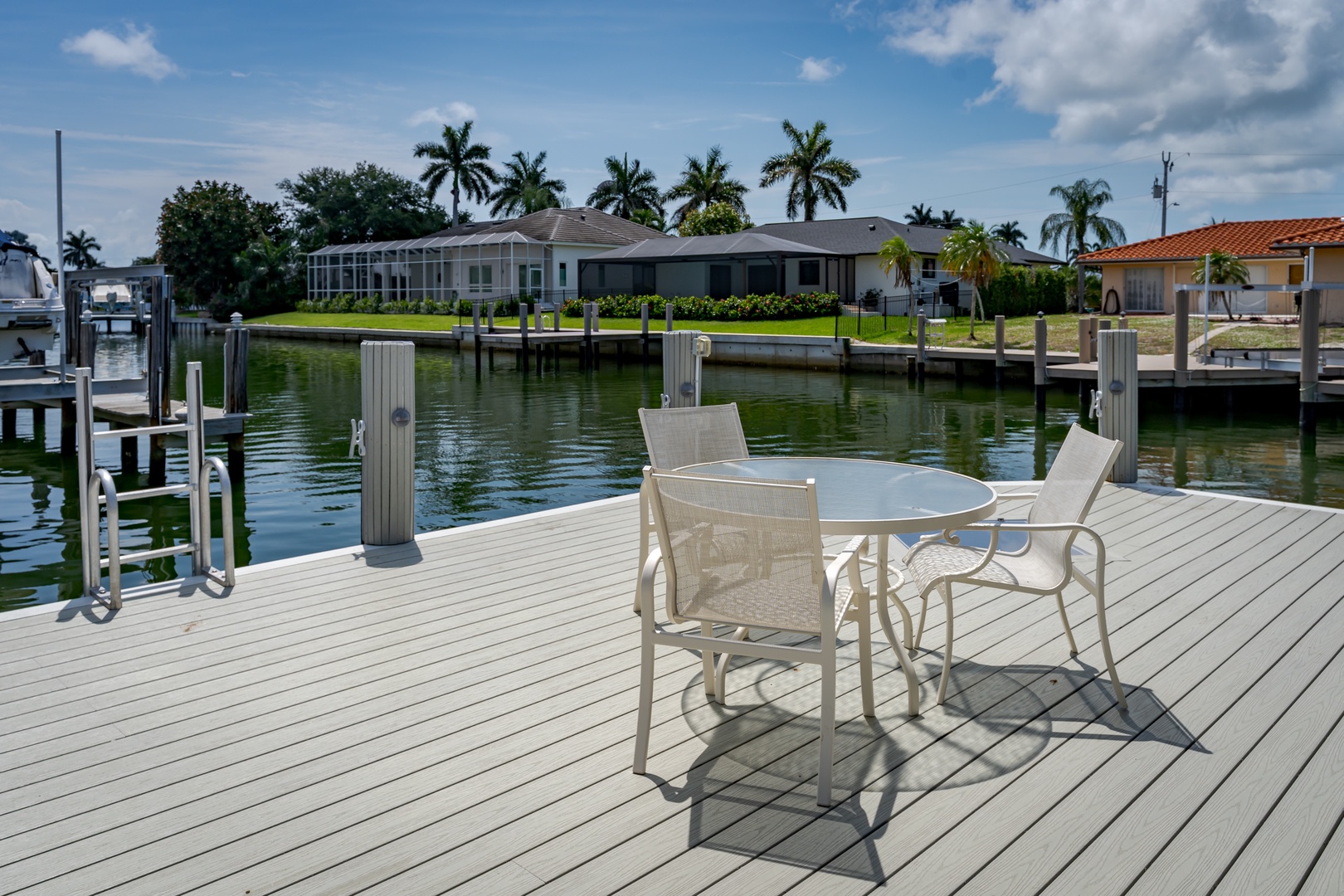 Enjoy your morning coffee or evening drinks at this waterfront dining spot, where palm-lined canal views and gentle breezes create the perfect backdrop for unwinding.