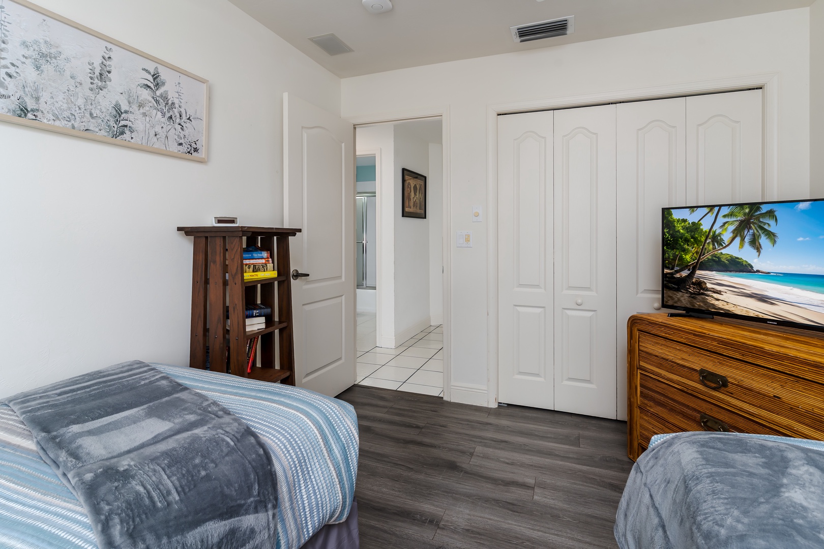 Unwind in your comfortable bedroom with soft bedding, thoughtful storage, and a flat-screen TV for your favorite shows and movies.