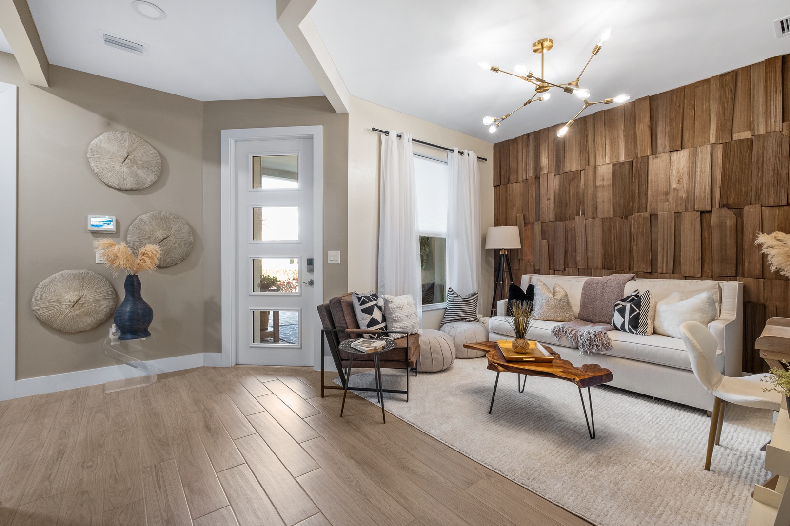 Sink into this stylish living space where warm wood textures meet modern comfort for your perfect evening unwind.