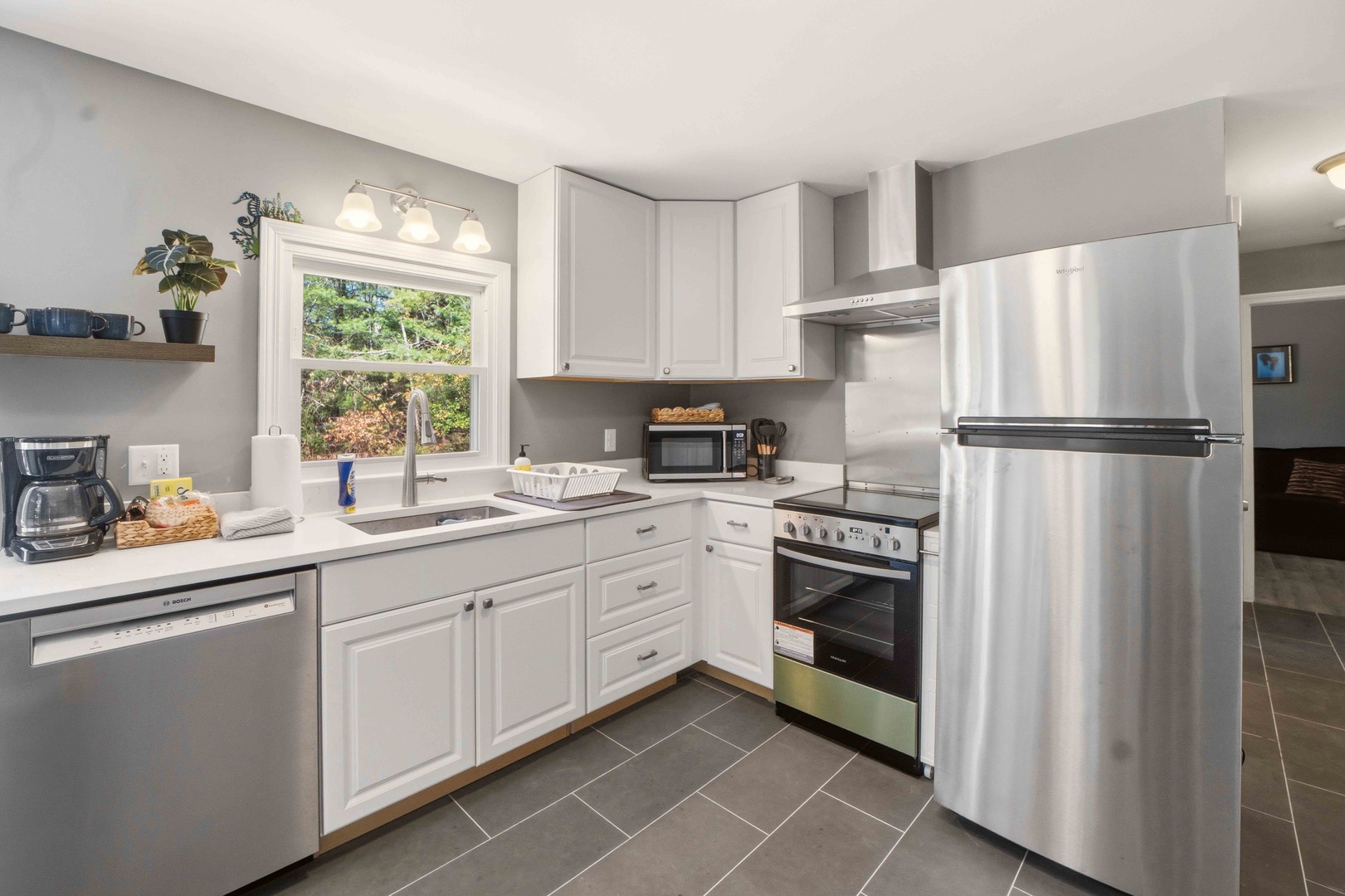 Your fully equipped kitchen awaits with stainless appliances, granite counters, and everything needed to create memorable meals during your stay.