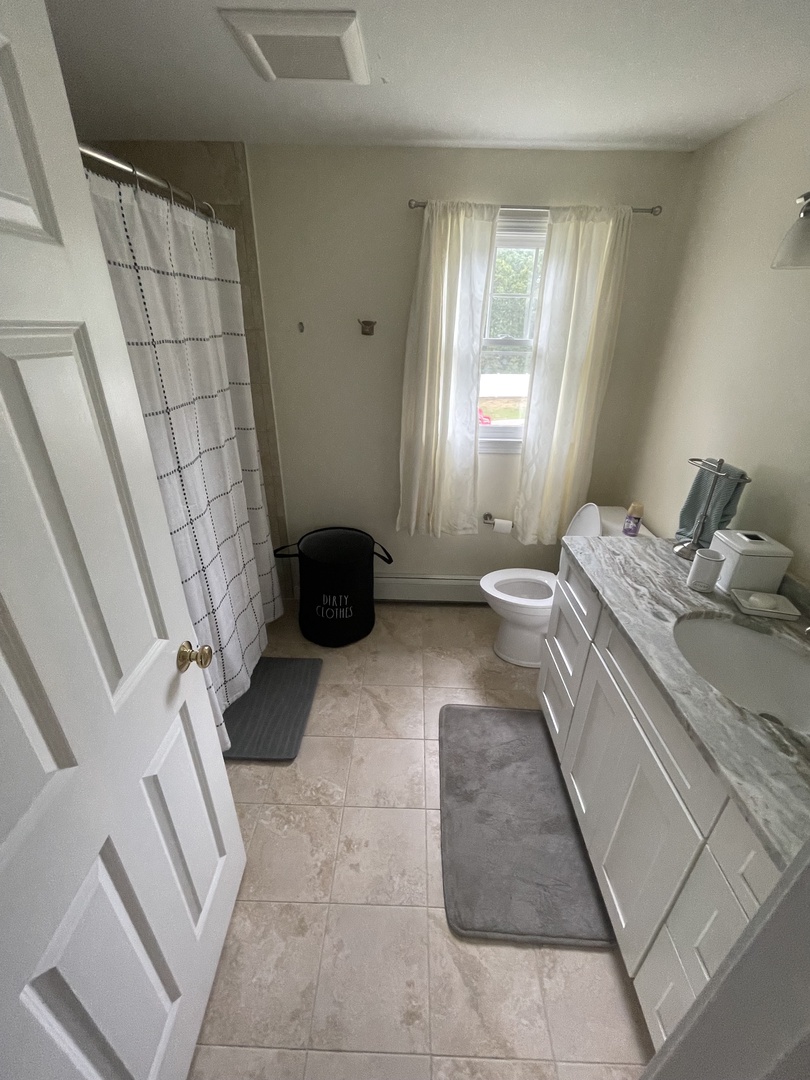 Your private bathroom features elegant marble finishes and modern fixtures for a luxurious start to each day.