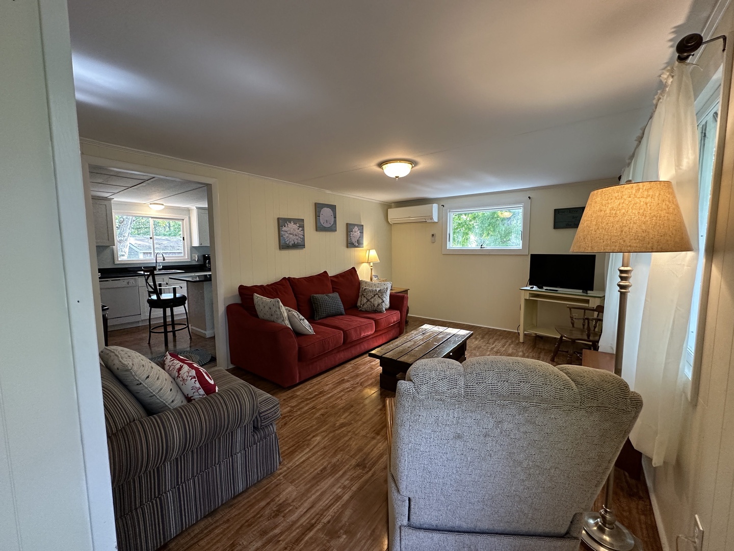 Relax in this inviting living space where warm lighting and comfortable seating create the perfect retreat after your adventures.