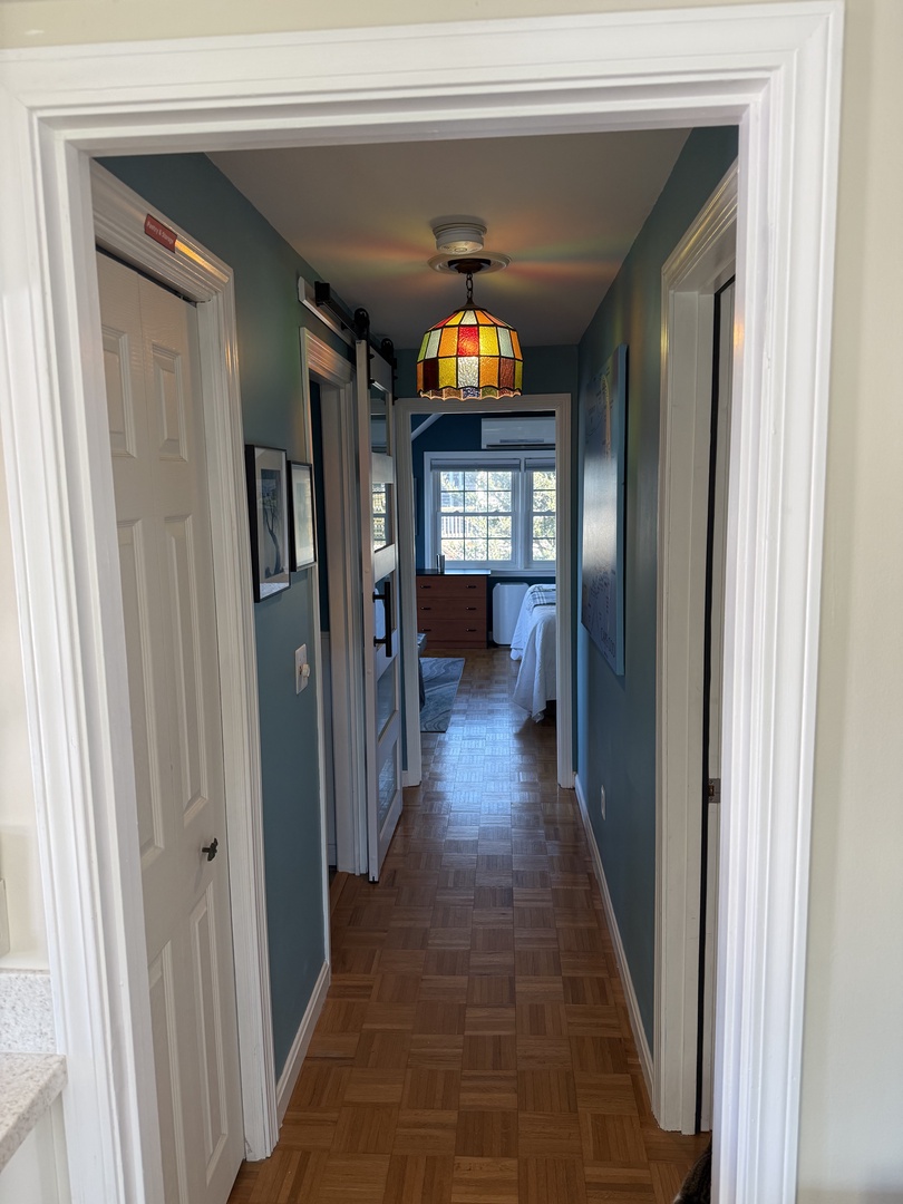 Your spacious kitchen welcomes you with elegant cabinetry, modern appliances, and warm lighting that creates the perfect atmosphere for preparing memorable meals.