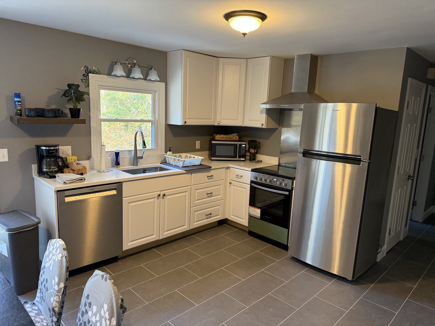 Your fully equipped kitchen features modern stainless steel appliances, ample counter space, and everything you need to prepare delicious meals during your stay.