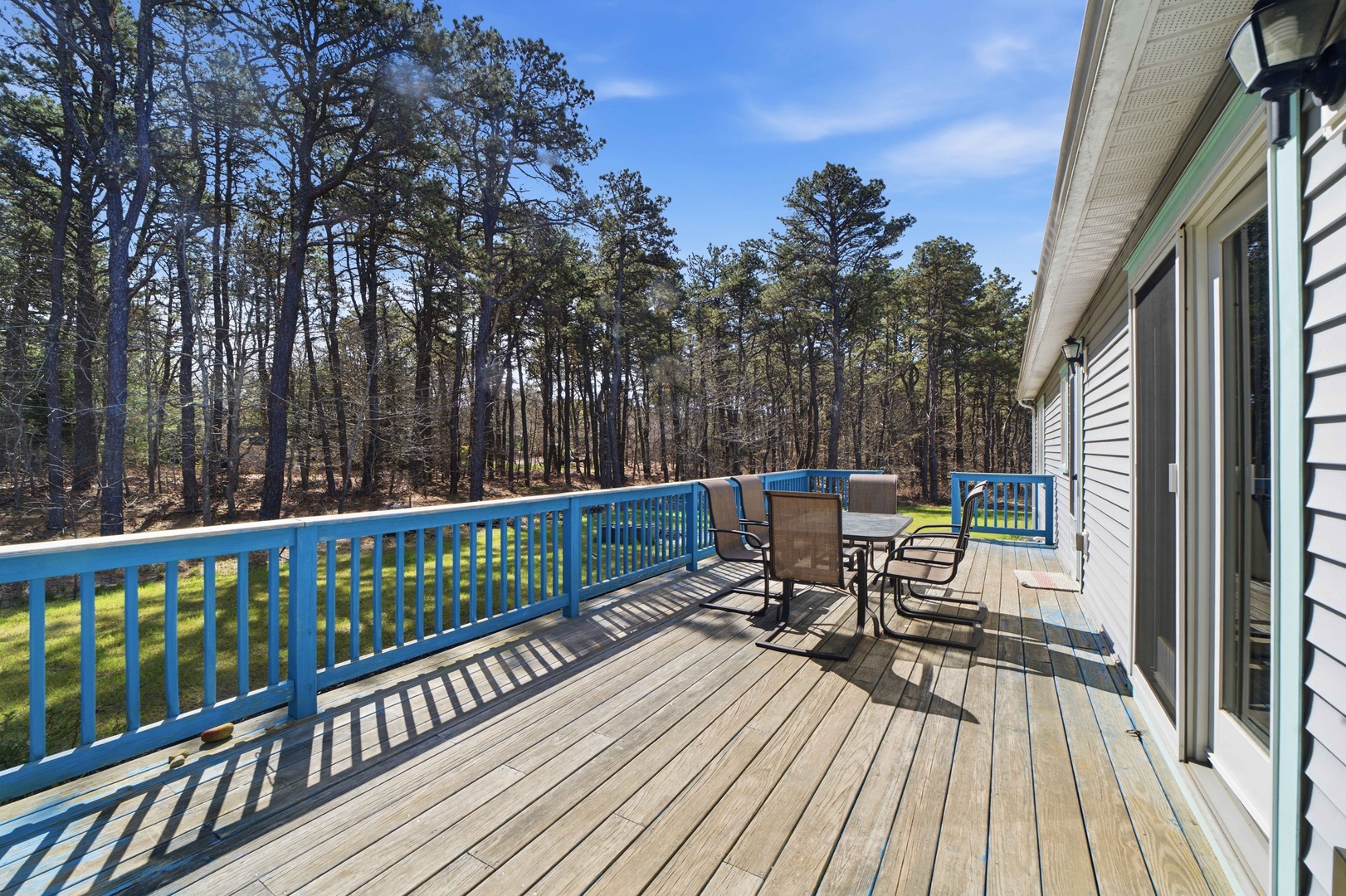 Step onto your private deck for morning coffee surrounded by towering trees and peaceful forest views.