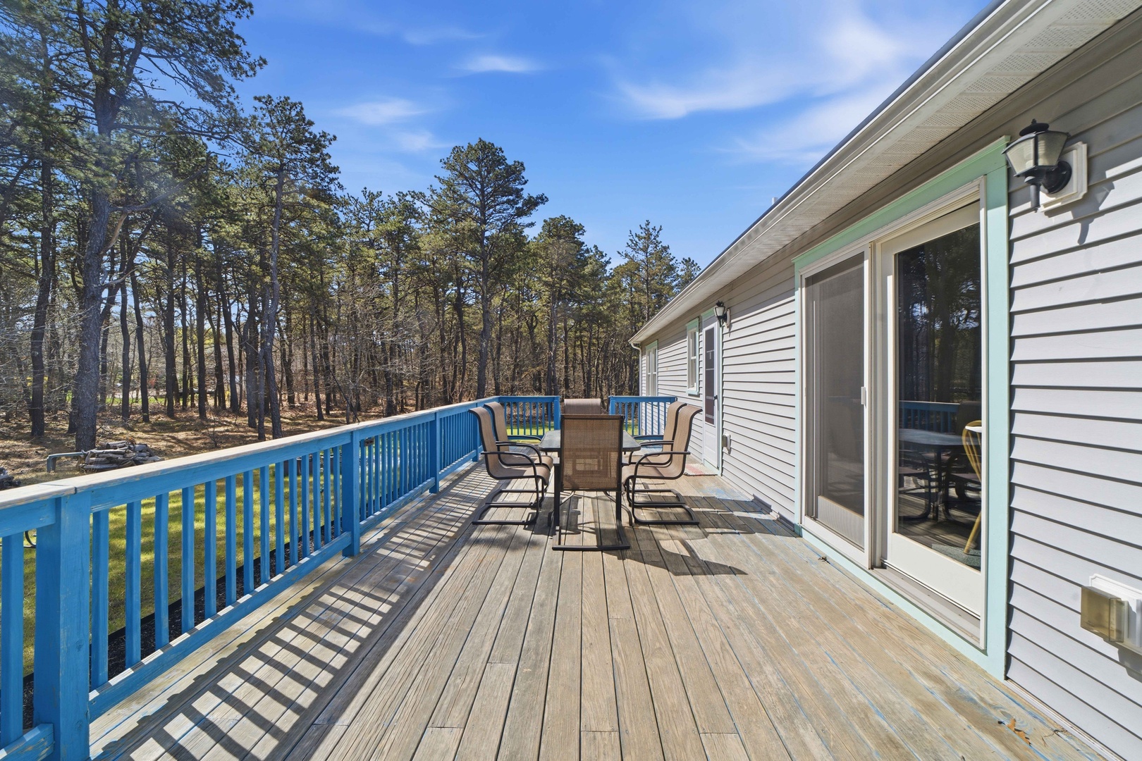 Step onto your private deck with outdoor dining and forest views for peaceful morning coffee or evening relaxation.
