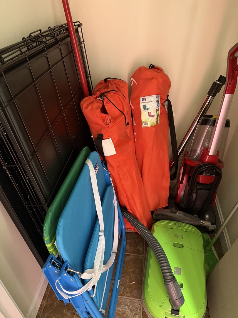 This organized storage closet keeps beach gear, vacuums, and essentials tidy and ready for your stay, so you can focus on fun, not clutter.
