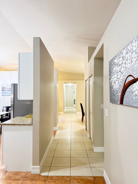 You'll love the open layout connecting your kitchen to bright living spaces, creating perfect flow for relaxation.