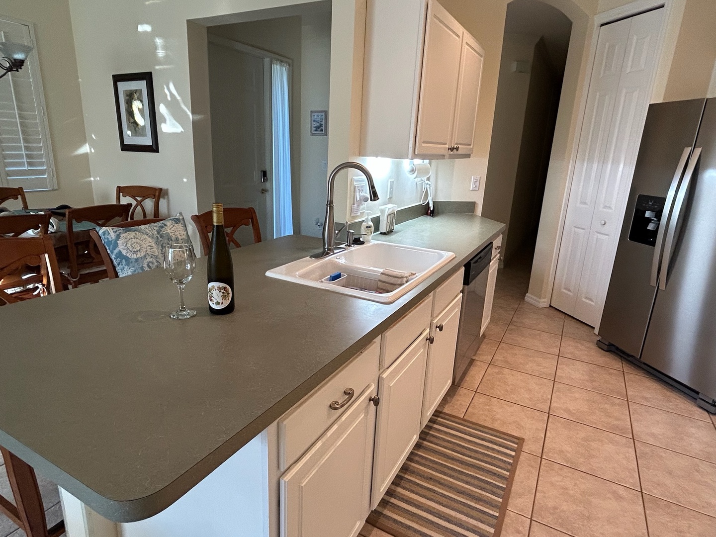 Your spacious kitchen island becomes the heart of your stay, perfect for morning coffee or preparing meals together.