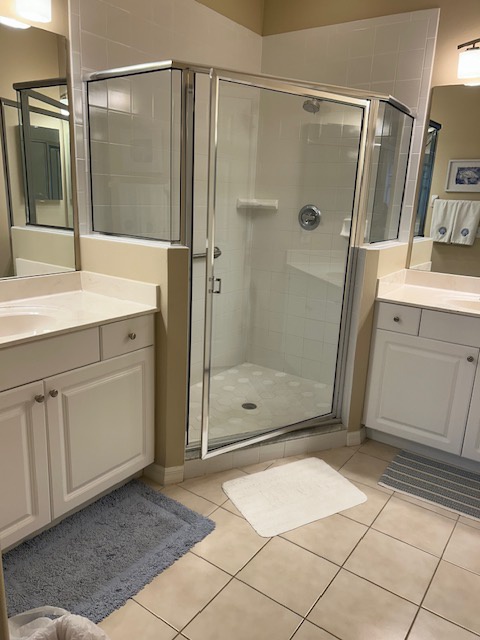 Step into your own private spa with a walk-in shower, dual vanities, and plush towels waiting for you after a day of exploring.